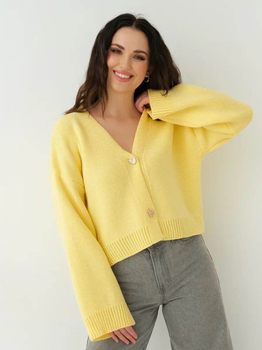Solara Cardigan by Lauven - Cropped yellow knit with heart buttons, adding warmth and style to your wardrobe.