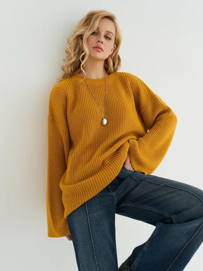 Solara Sweater by Lauven, oversized knit in vibrant mustard yellow, combining style and comfort.