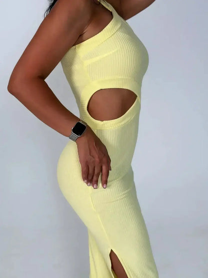 Sunlace Midi Dress in pastel yellow featuring cutouts and ribbed texture, perfect for warm-weather elegance.