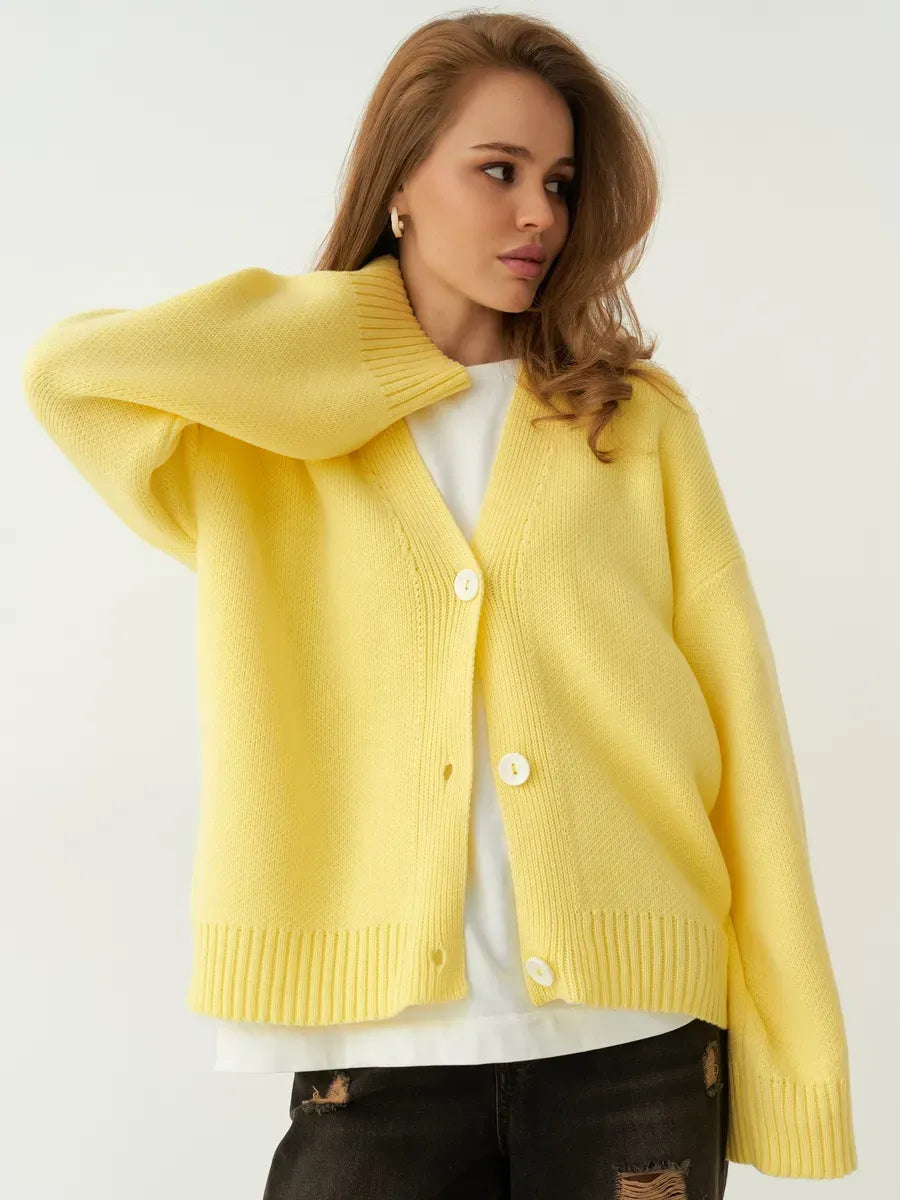 Sunny Cardigan by Lauven in creamy yellow, featuring oversized knitwear and button closure, perfect for casual or office wear.