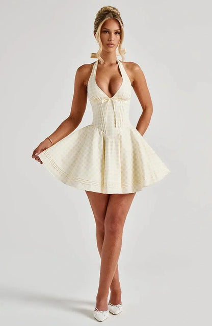 Sunny Mini Dress with halter neckline in yellow gingham print, perfect for summer weddings and special occasions.