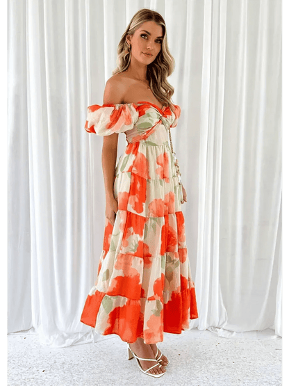 Sunset Bloom Maxi Dress featuring off-shoulder design and tiered ruffles in vibrant floral print, perfect for weddings or summer events.