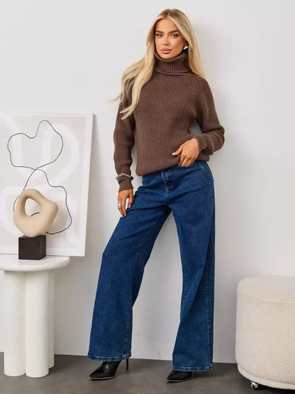 Terra Sweater by Lauven - Oversized brown knit turtleneck worn with blue wide-leg jeans.