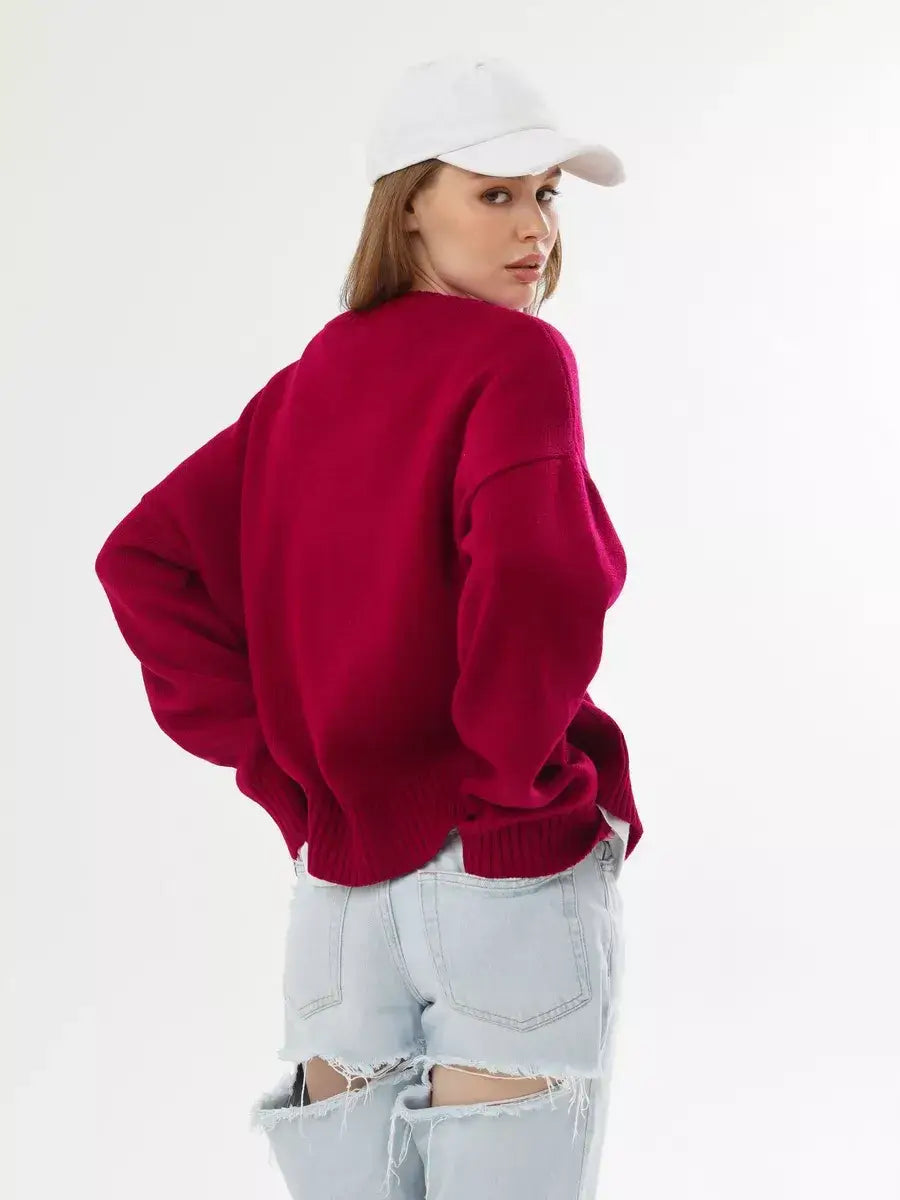 Vela Pullover by Lauven, oversized cropped women's sweater in burgundy, stylishly paired with denim.