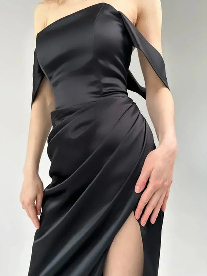 Elegant off-shoulder Velour Nights Maxi Dress featuring draping and a high slit for chic evening allure.