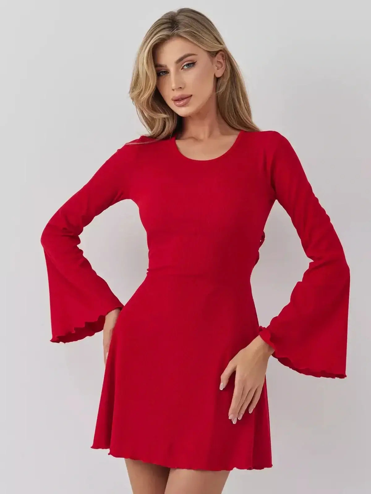 Stunning Velvet Flame red mini dress from Lauven featuring a flared sleeve design and flattering A-line silhouette.