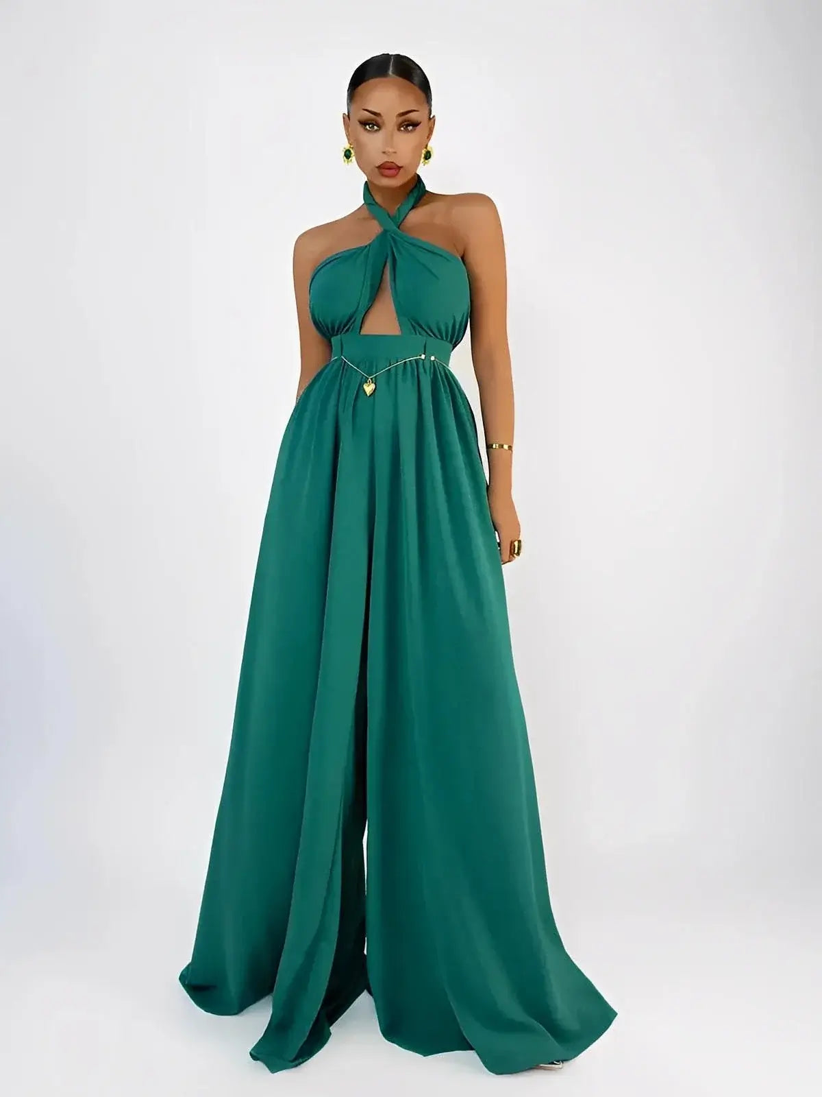 Verona Jumpsuit by Lauven in rich emerald, featuring halter neck, open back, and wide leg design for elegant summer style.