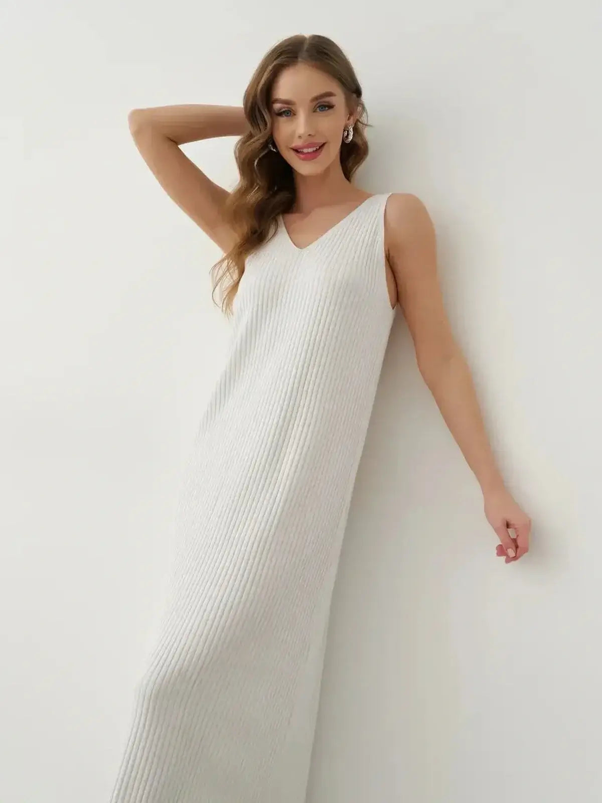 Model showcasing the Verona Maxi Dress in ribbed cotton-acrylic knit, exuding effortless elegance and sophistication.