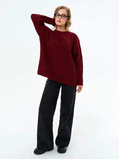 Model wearing Lauven Verona Sweater in deep burgundy with relaxed oversized fit and round neckline.