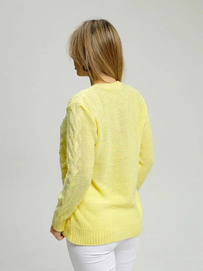 Back view of a woman wearing the Lauven Vienna Sweater in soft yellow knit for a chic look.