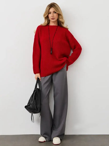 Viona Sweater by Lauven - Oversized red knit with crew neck, styled with gray pants and a black bag.