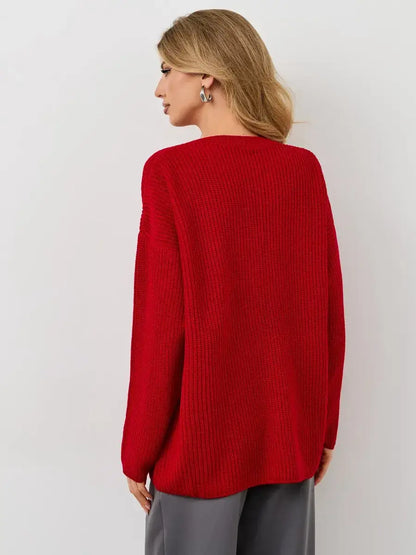 Viona Sweater by Lauven - Oversized red knit with crew neck, showcasing a chunky ribbed texture from the back.