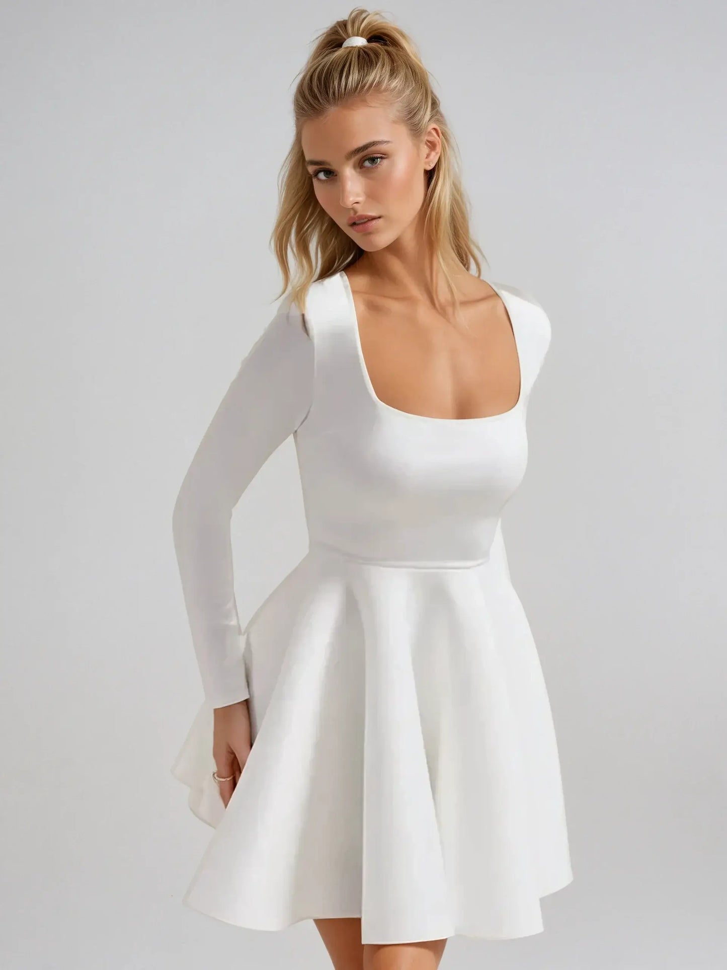 White fit-and-flare mini dress with long sleeves and square neckline, perfect for summer and formal occasions.